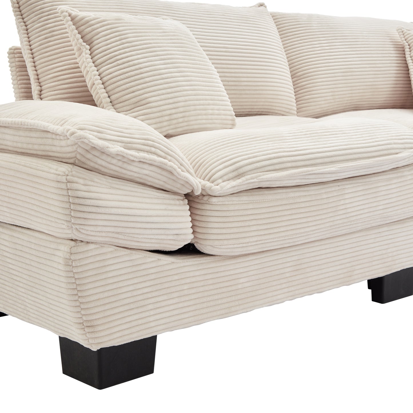 Cream corduroy sofa with plush cushions and dark wood legs a cozy living room accent