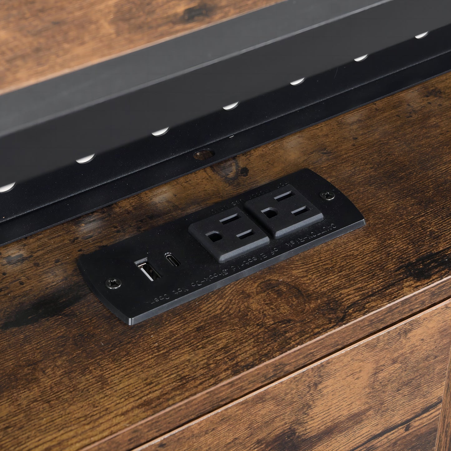 Wooden desk with integrated power strip featuring two USB ports and two AC outlets