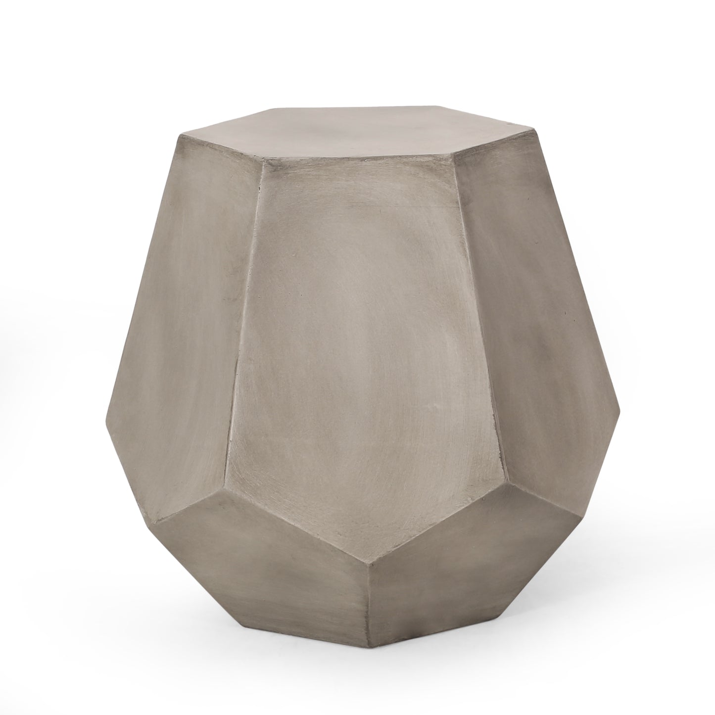 Geometric concrete garden stool with faceted sides in a neutral gray hue