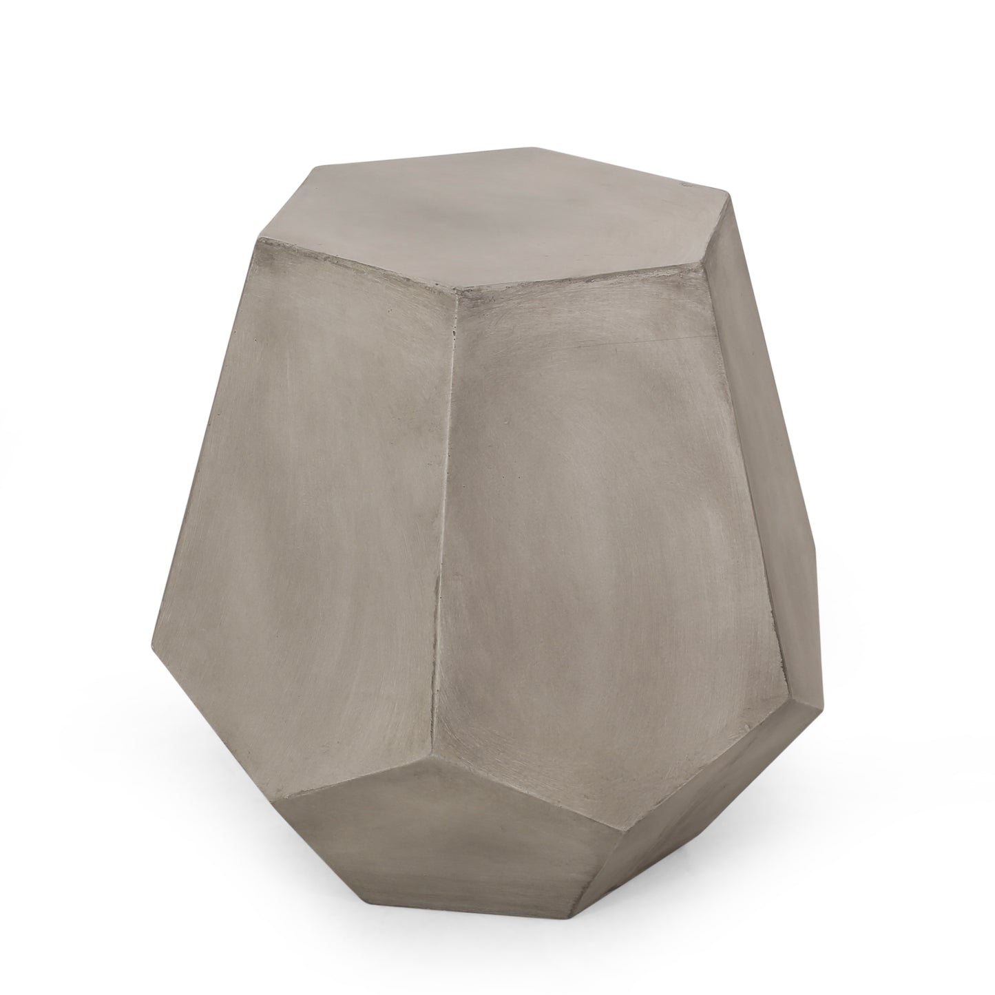 Geometric grey concrete garden stool with faceted sides and a flat top