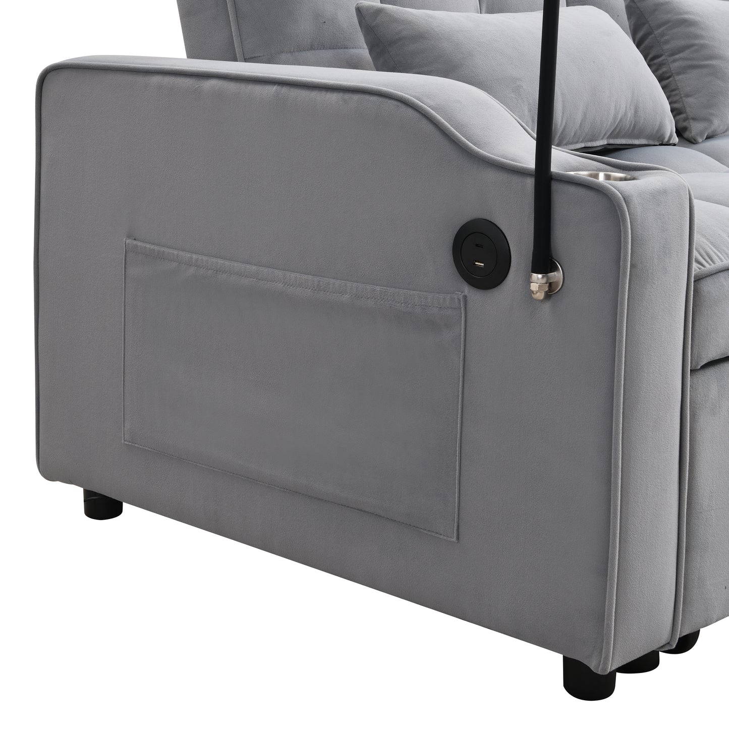 Gray velvet sofa armrest with builtin USB charging ports and a cup holder