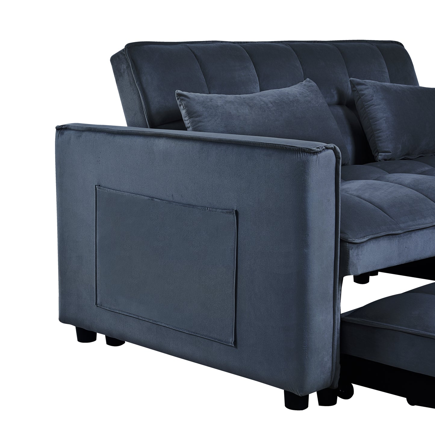 Dark gray velvet sofa with tufted back cushions and a side storage pocket