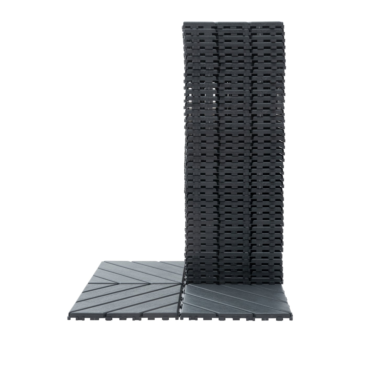 Stack of dark grey interlocking deck tiles with a ribbed surface pattern