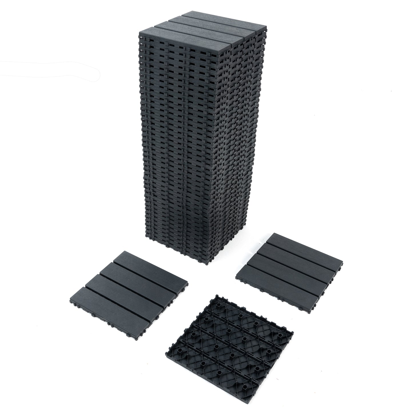 Stack of dark grey interlocking deck tiles for outdoor patios