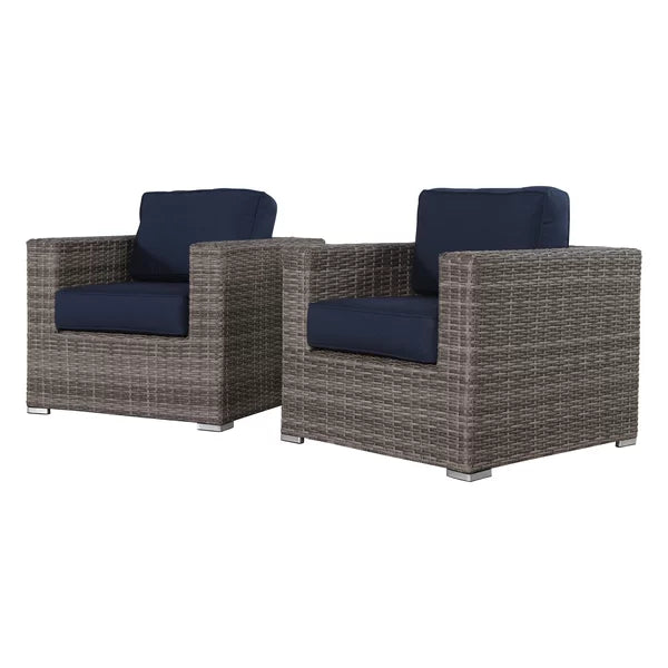 Two gray wicker armchairs with navy blue cushions modern outdoor furniture set