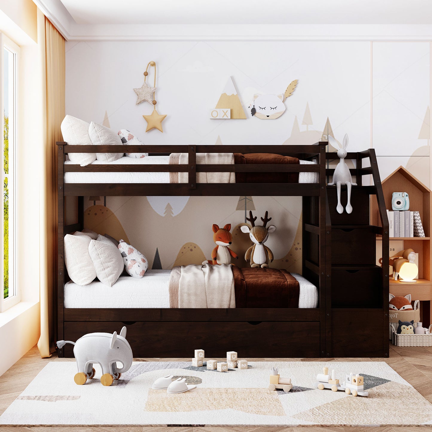 Dark brown wooden bunk bed with pullout trundle plush pillows and forestthemed bedding