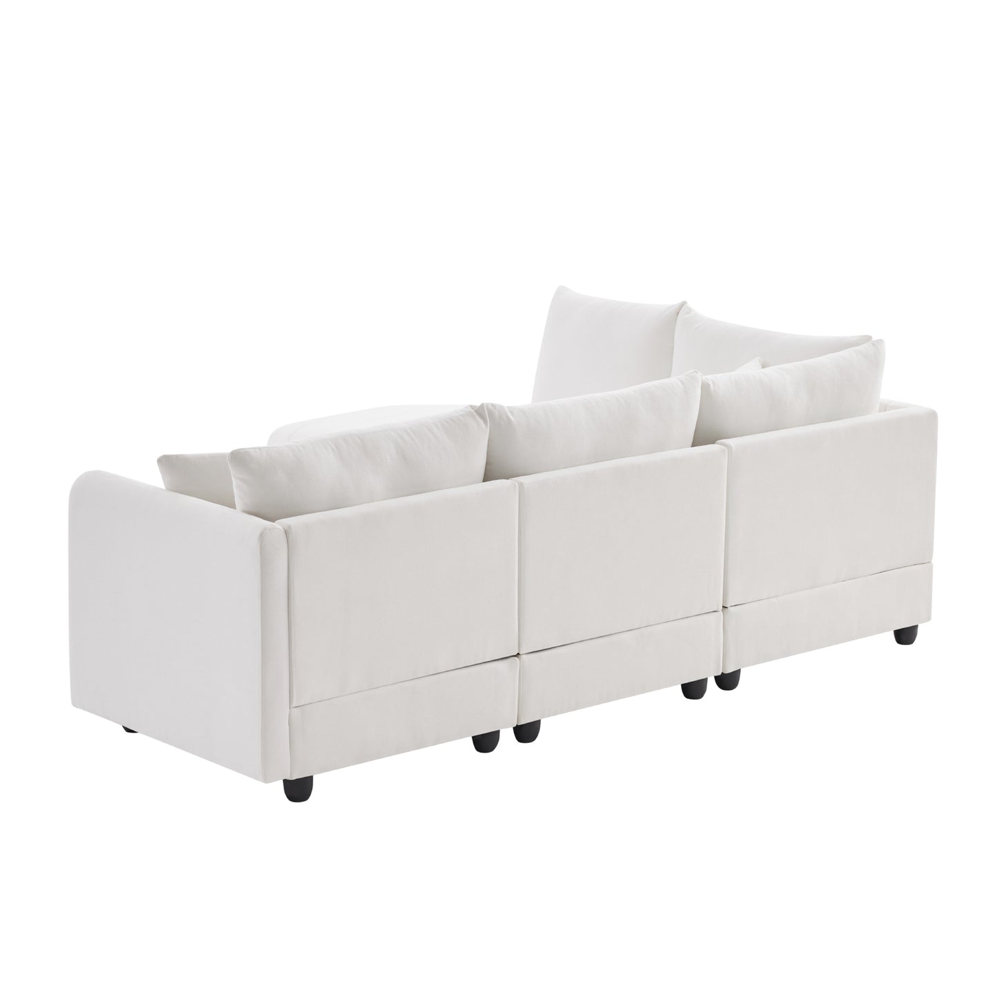Rear view of a plush white sectional sofa with deep seating and comfortable throw pillows