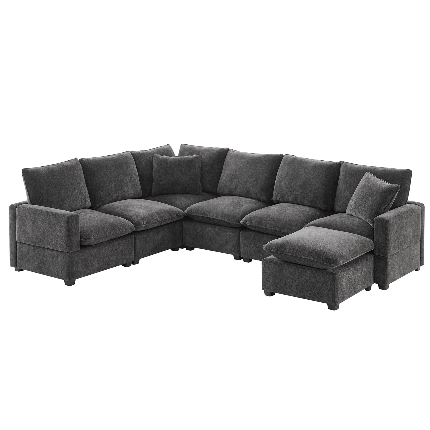 Dark gray upholstered sectional sofa with plush cushions and an ottoman