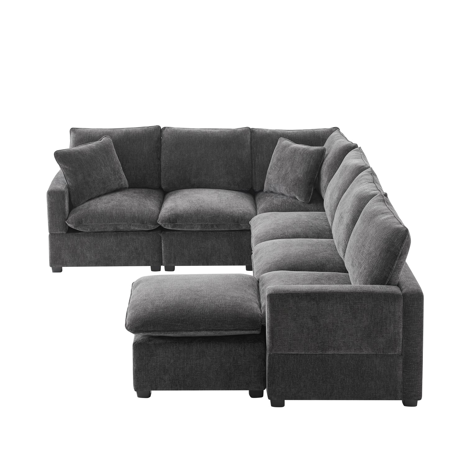 Dark gray fabric sectional sofa with plush cushions and matching throw pillows