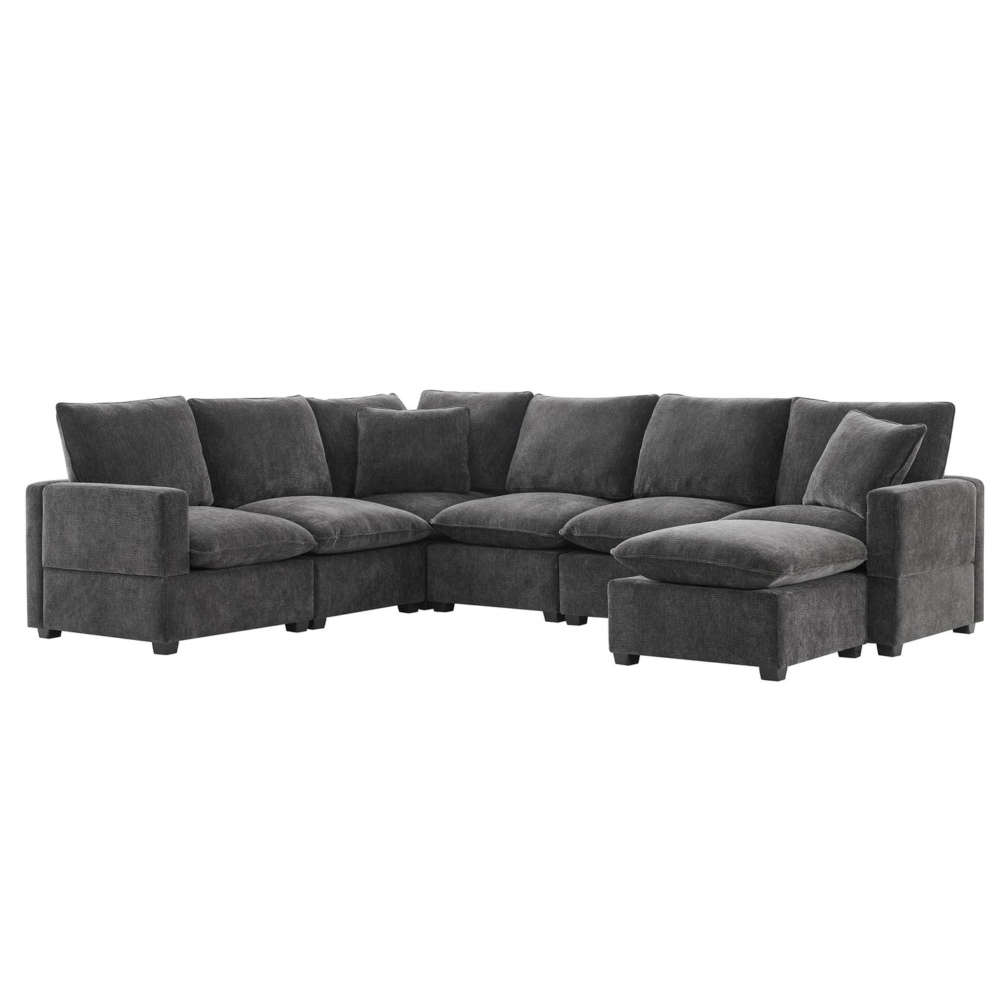 Dark gray fabric sectional sofa with plush cushions and ottoman