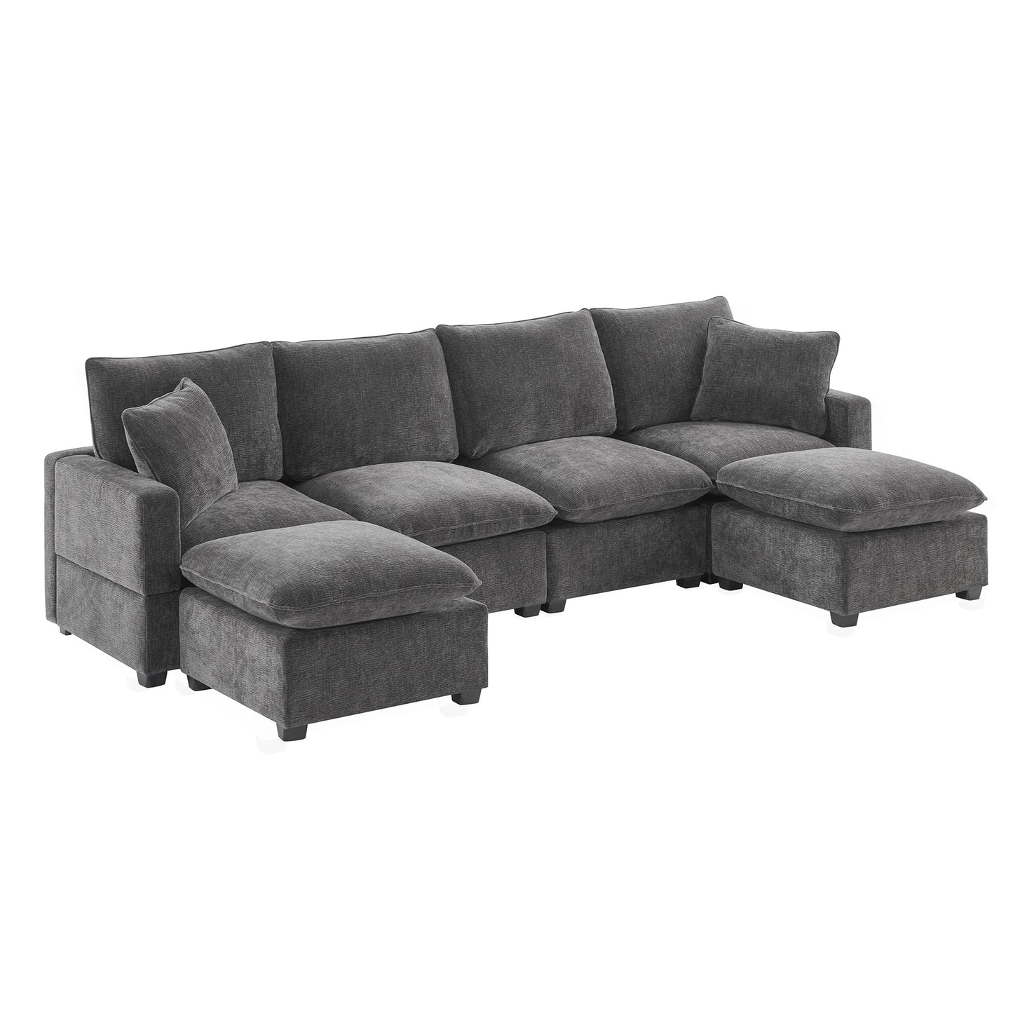 Dark gray fabric sectional sofa with deep cushions and multiple ottomans for a modern living room