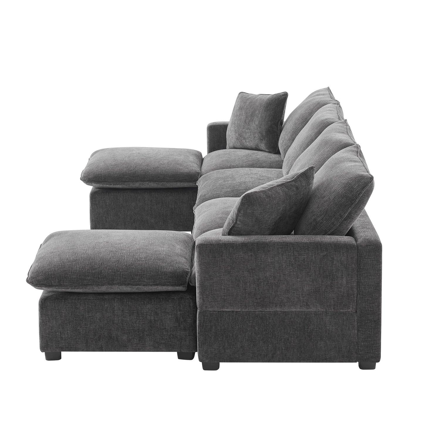 Plush charcoal grey sectional sofa with deep seating and multiple throw pillows