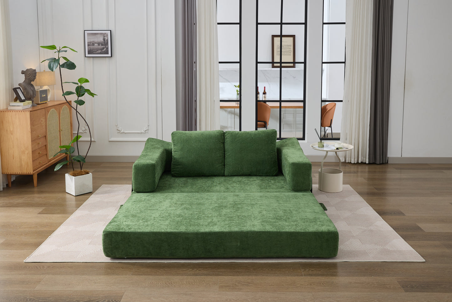 Convertible green sofa bed with textured fabric ideal for small apartments