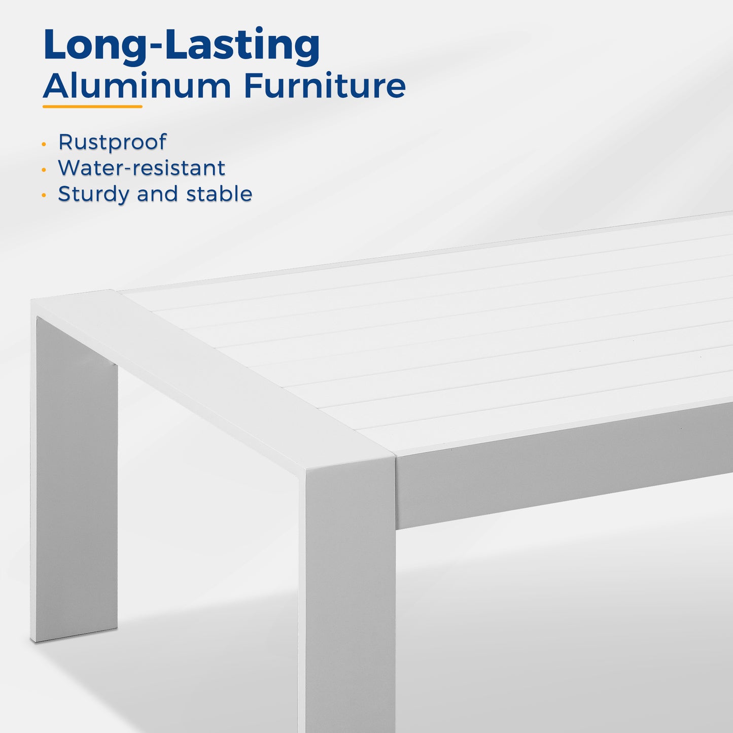 Closeup of a white aluminum coffee table with slatted top and sturdy legs