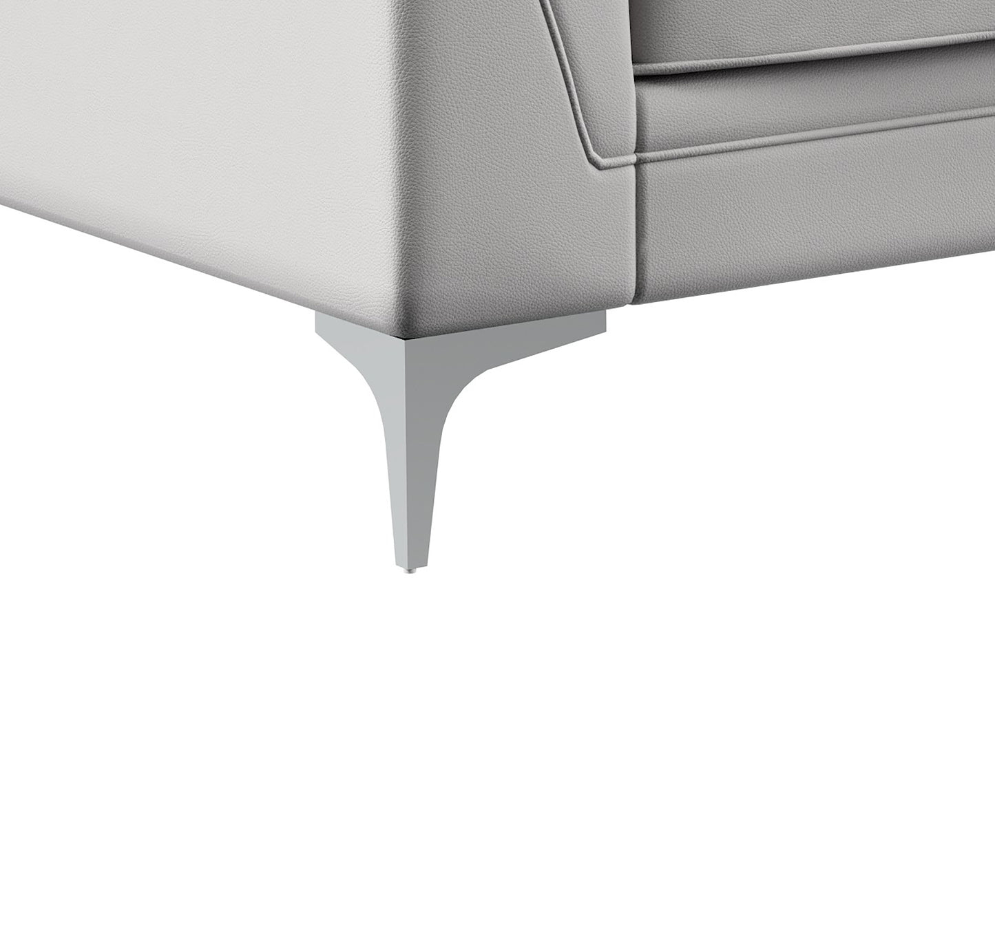 Closeup of a grey faux leather sectional sofa corner with a modern silver metal leg