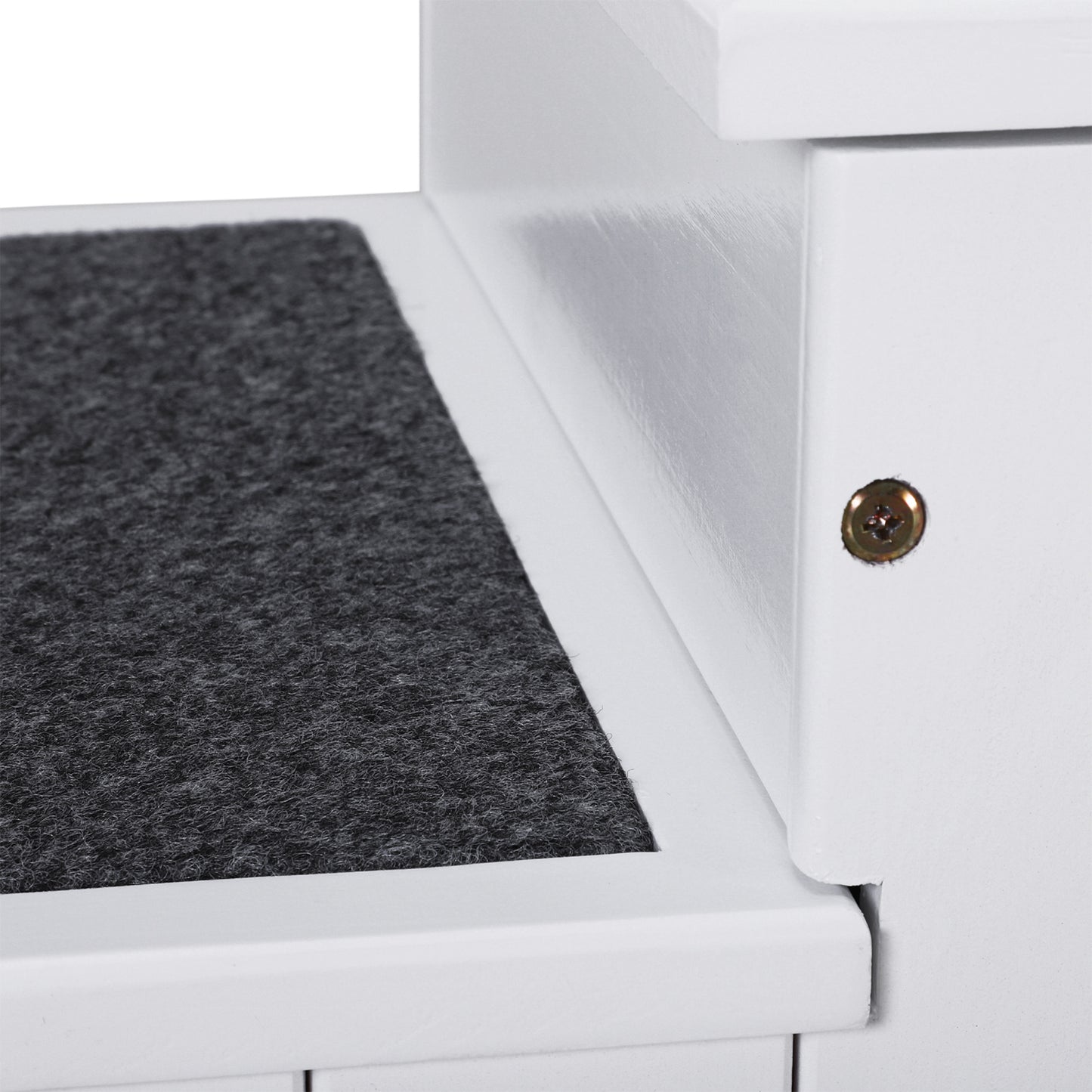 White pet stairs with dark gray carpeted steps for secure climbing