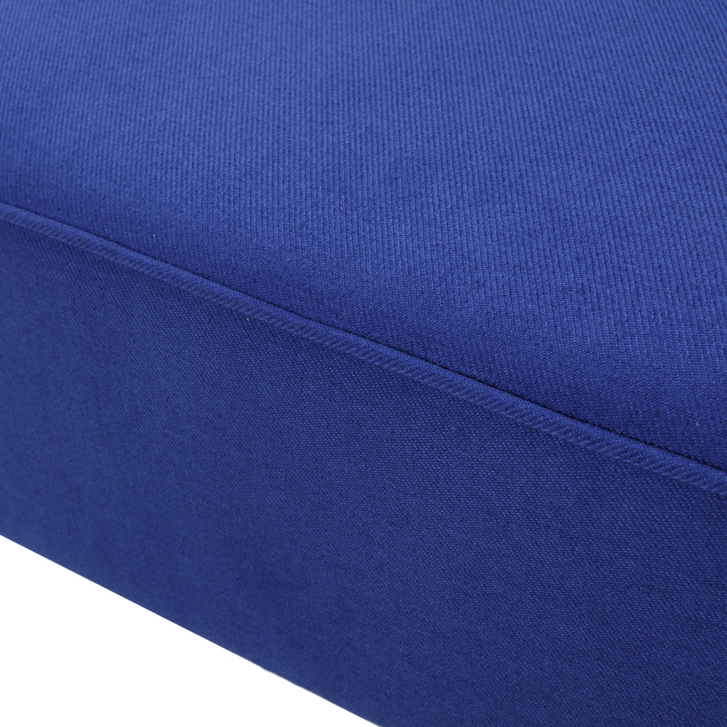 Closeup of rich royal blue woven fabric with visible texture ideal for upholstery
