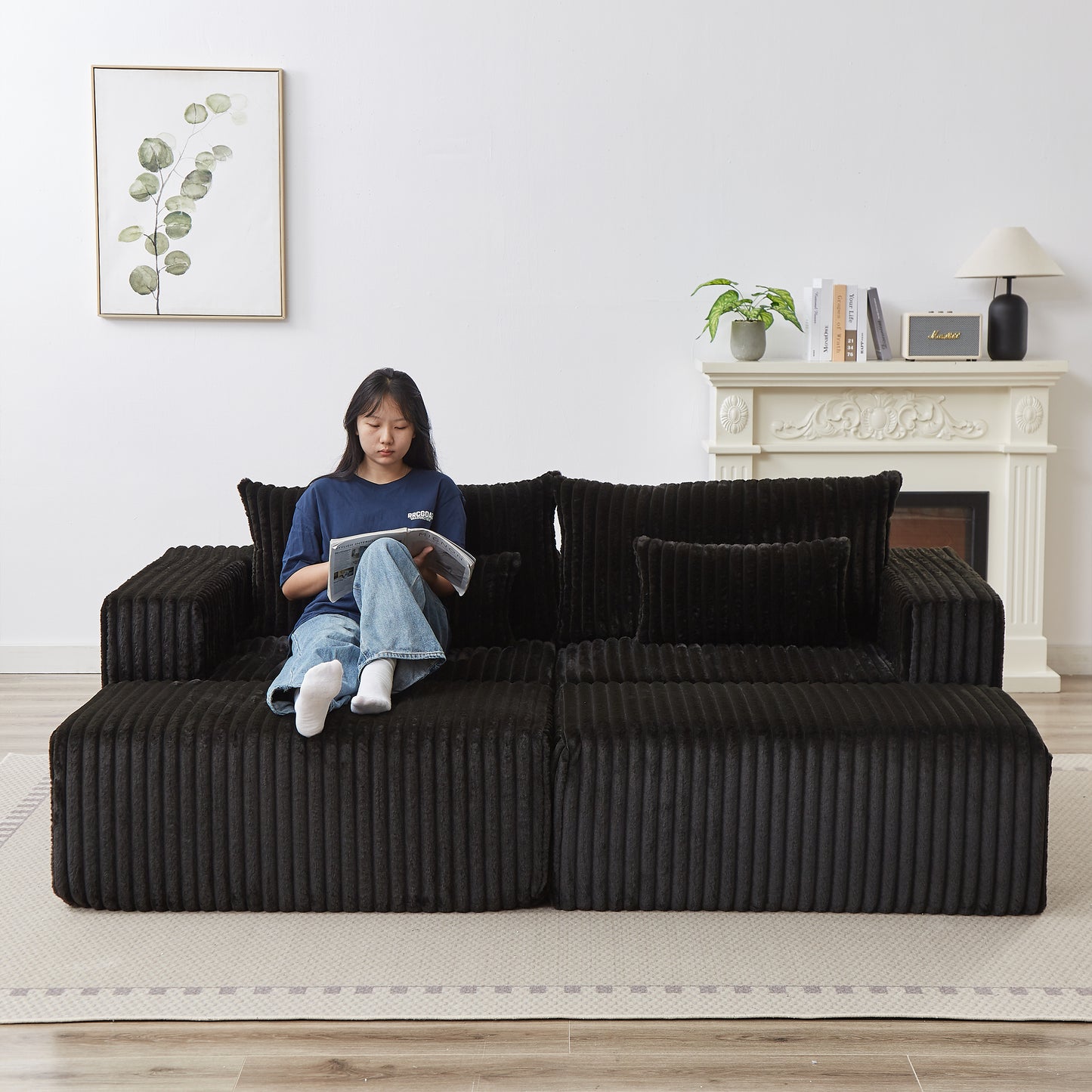 Plush black sectional sofa with textured fabric perfect for modern living room comfort