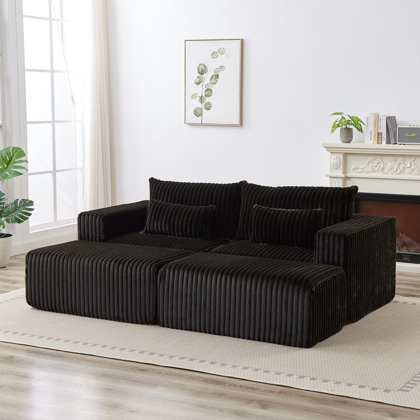 Plush corduroy black sofa with removable chaise lounge perfect for modern living rooms