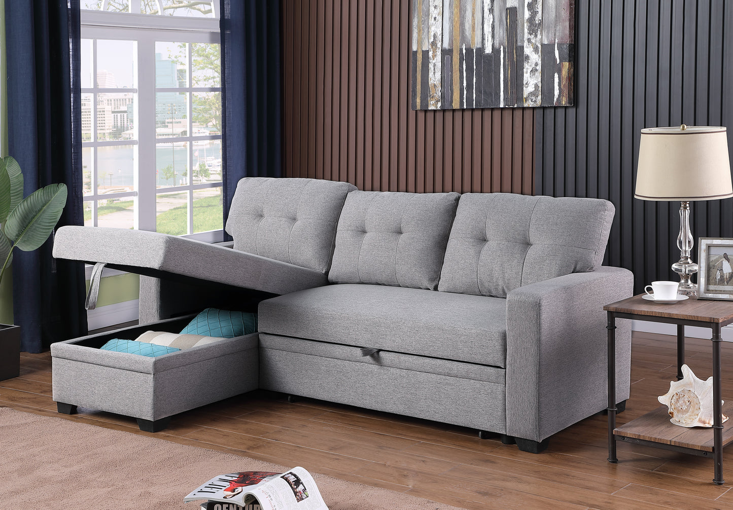 Gray fabric sectional sofa with pullout bed feature and hidden storage compartment