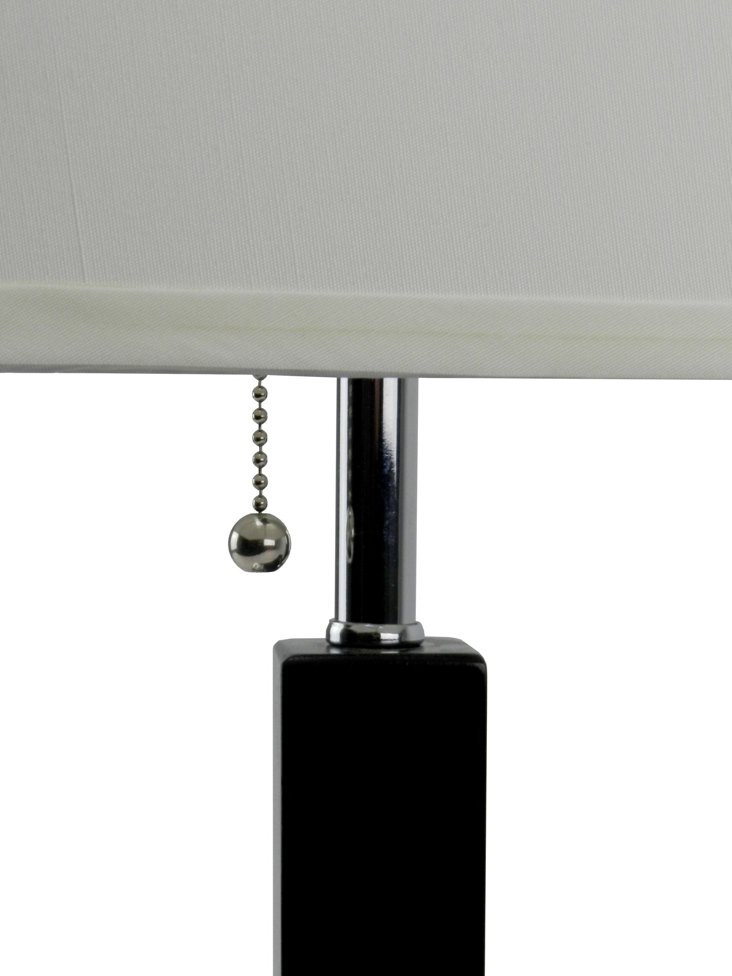 Close up of a modern black table lamp base with chrome pole and pull chain