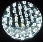 Clear crystal chandelier droplet catching light with elegant sparkle