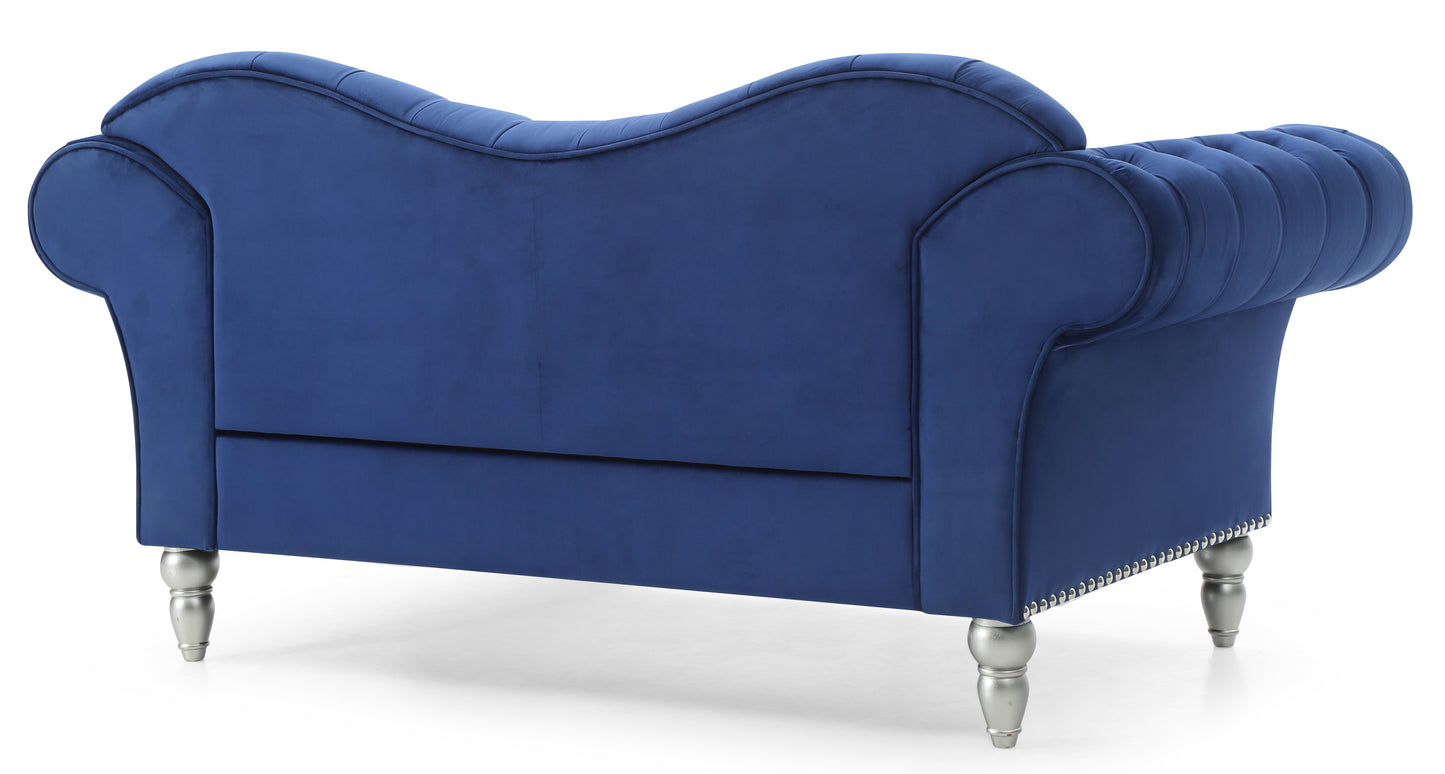 Deep blue velvet chesterfield loveseat with tufted back and silver cabriole legs