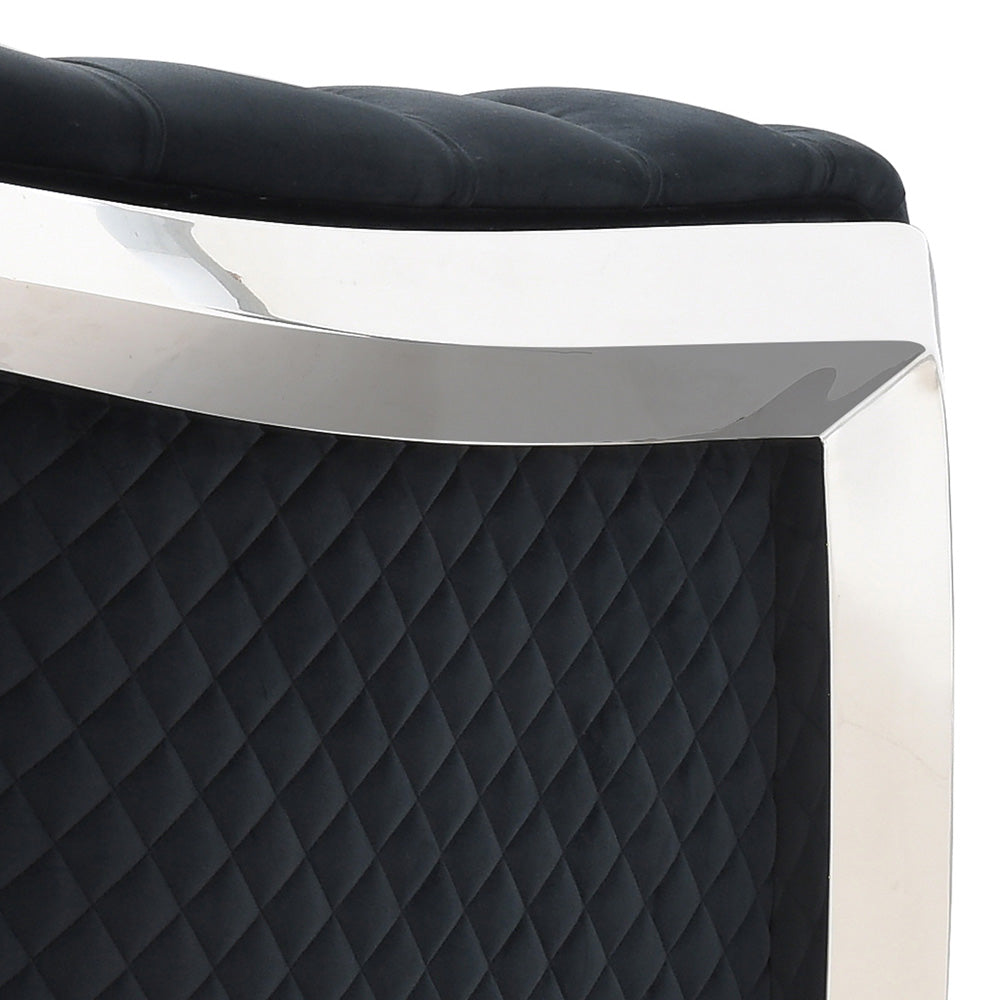 Black tufted velvet accent chair with polished chrome frame