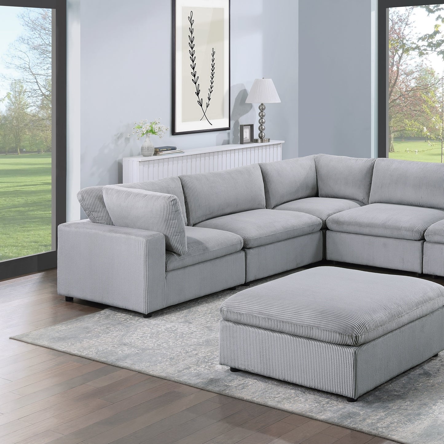 Light grey corduroy sectional sofa with plush cushions perfect for modern living rooms
