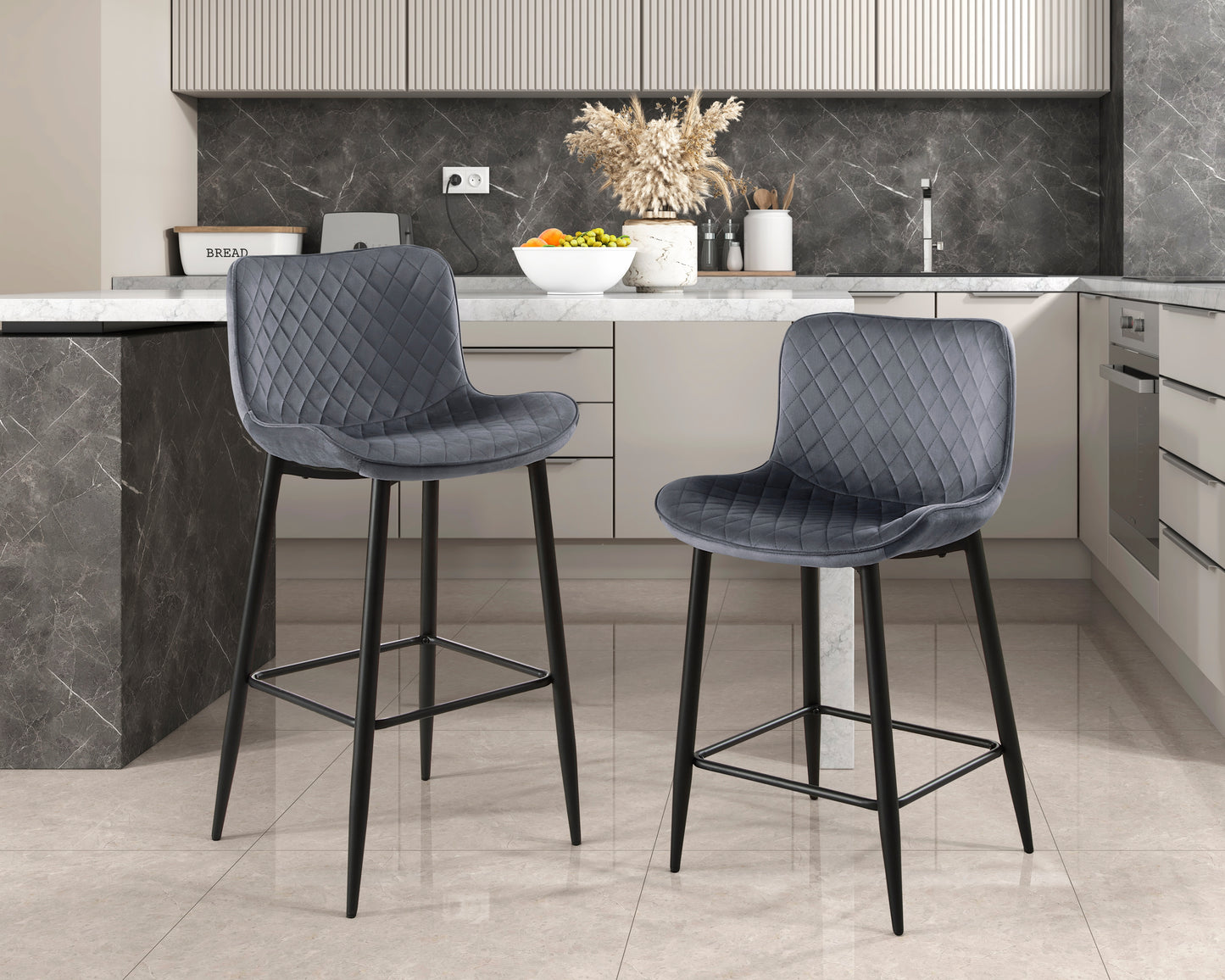 Grey velvet diamondstitched bar stool with black metal legs perfect for kitchen islands