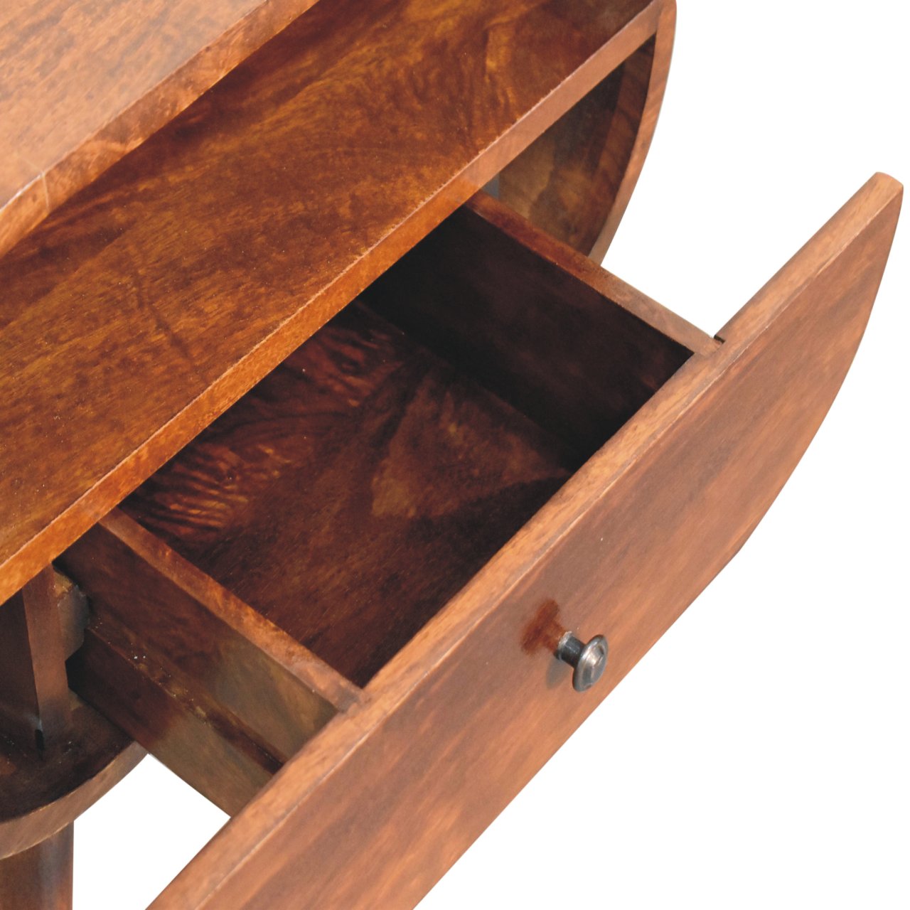 Closeup of an open drawer on a dark wood accent table