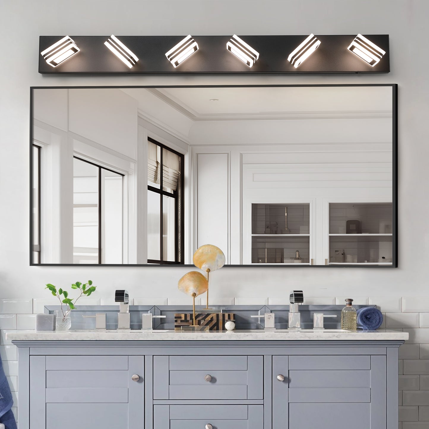 Modern black vanity light fixture with five adjustable LED lights above a large bathroom mirror