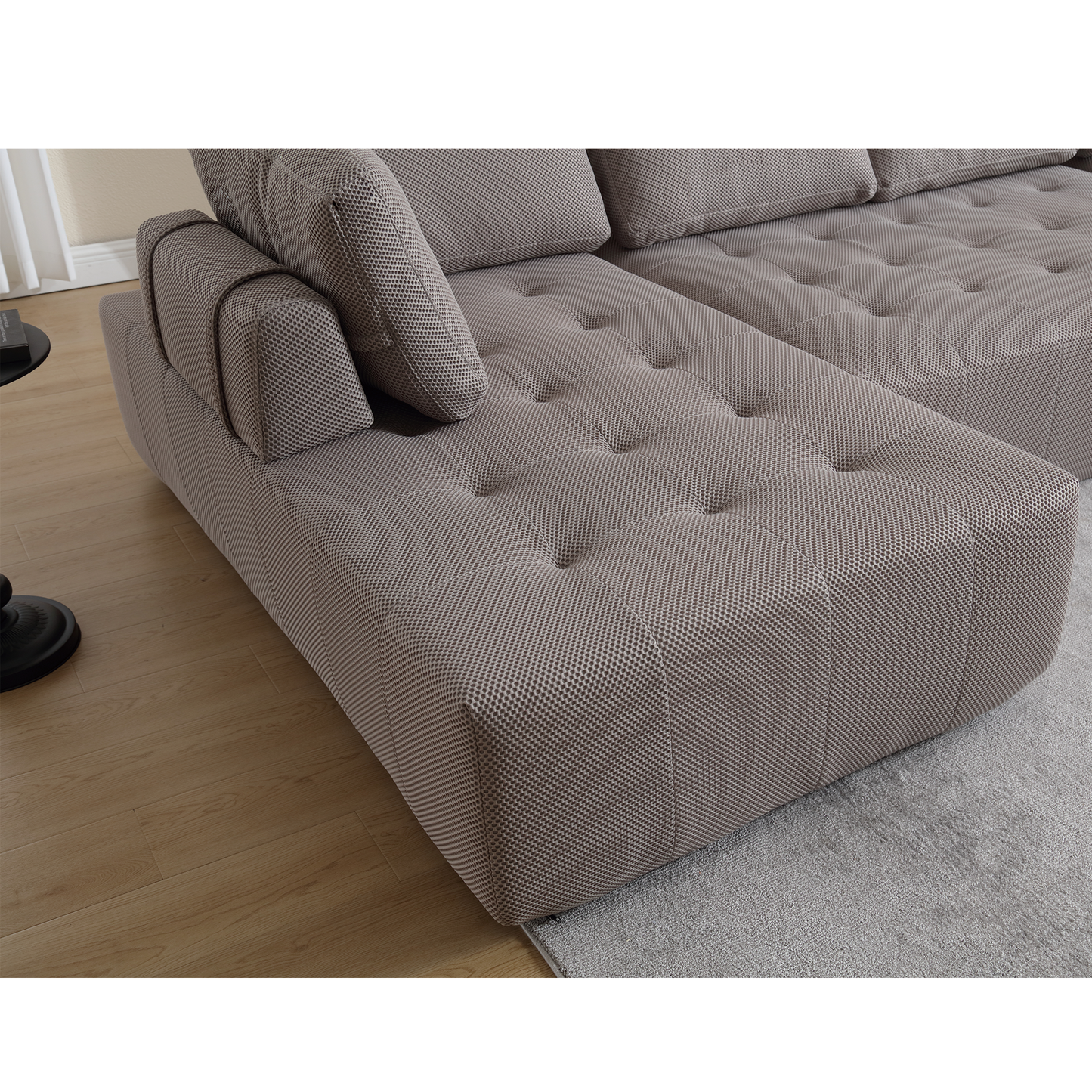 Modern grey sectional sofa with tufted cushions and patterned fabric perfect for living rooms