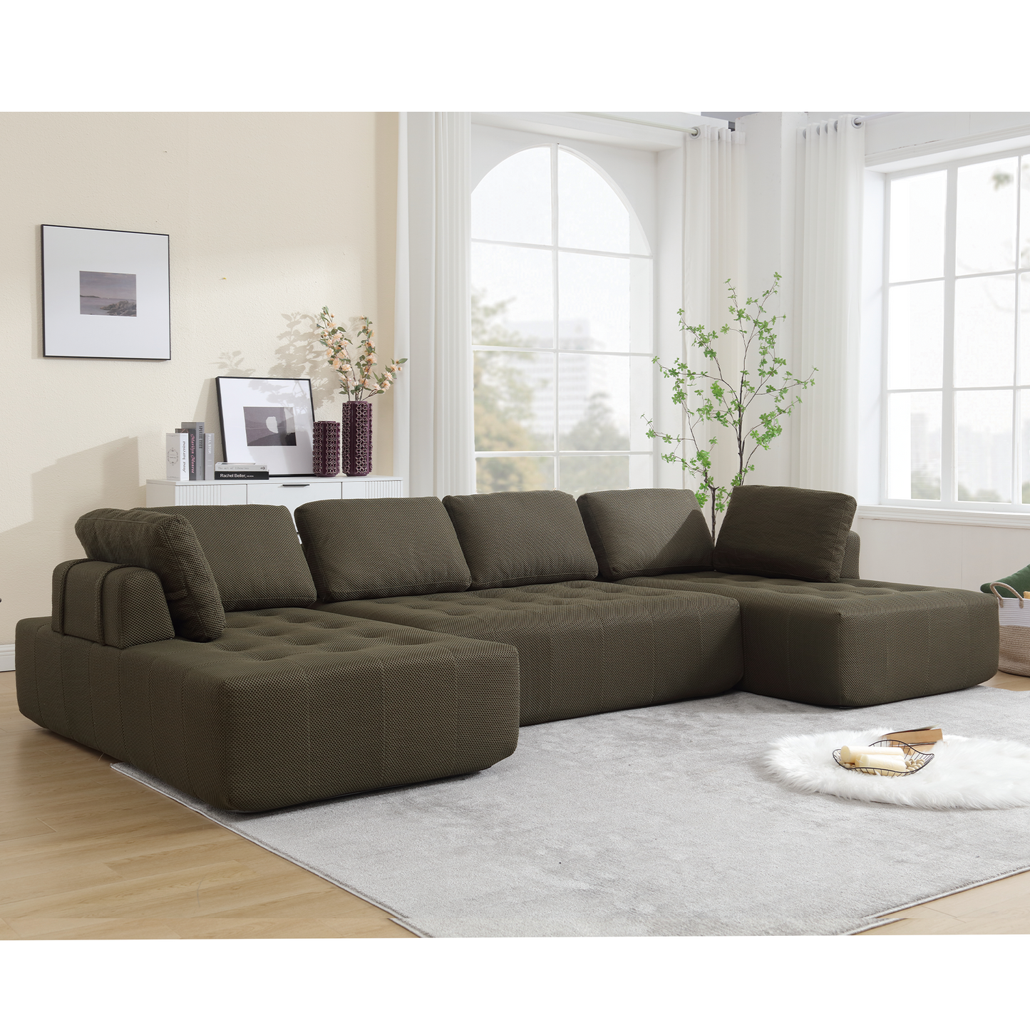 Spacious sectional sofa in dark olive fabric featuring deep seats and multiple throw pillows for comfort