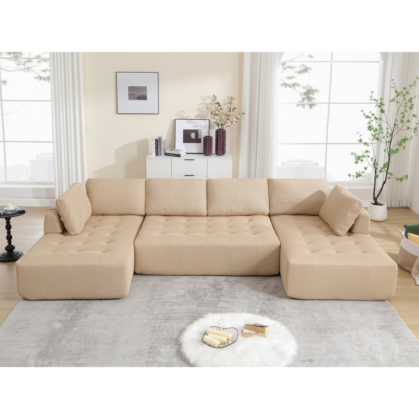 Tufted beige fabric sectional sofa with plush cushions and an Lshaped configuration for spacious living