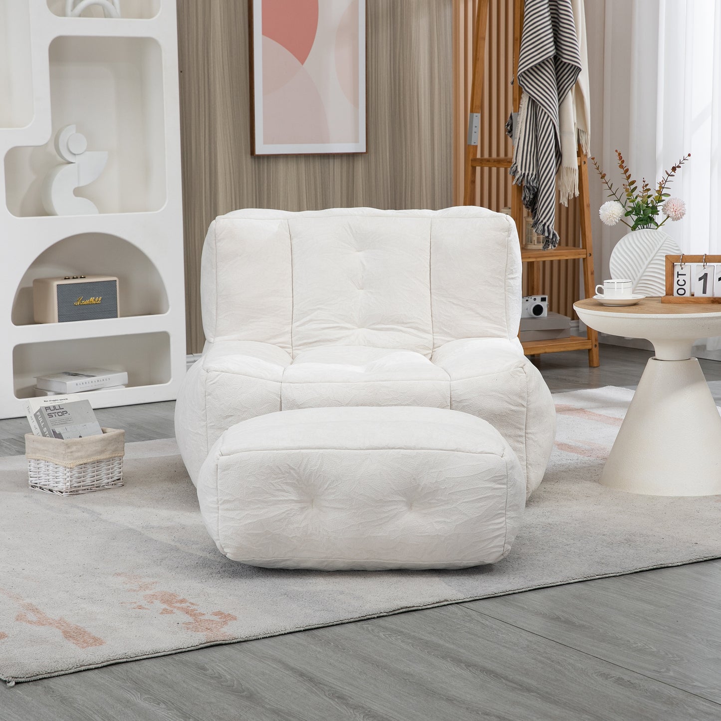 Plush white bean bag chair with tufted details and matching ottoman perfect for modern living rooms