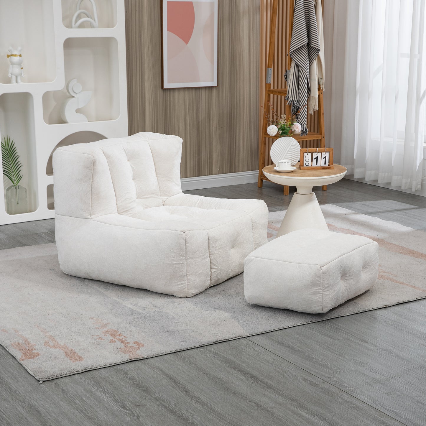 Plush white boucle armchair with an ottoman perfect for a cozy living room