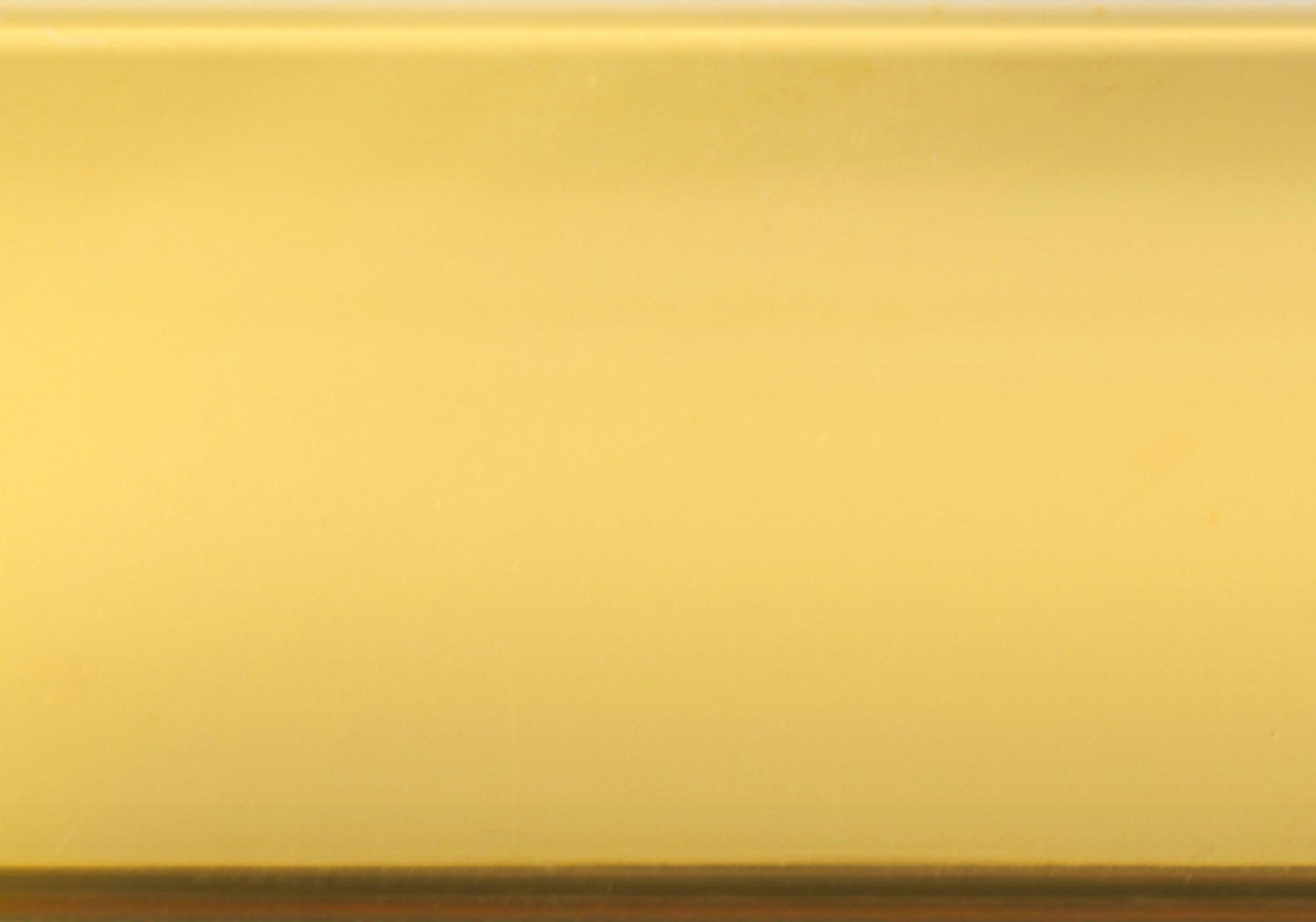 Polished brass metal sheet with subtle texture for crafting projects