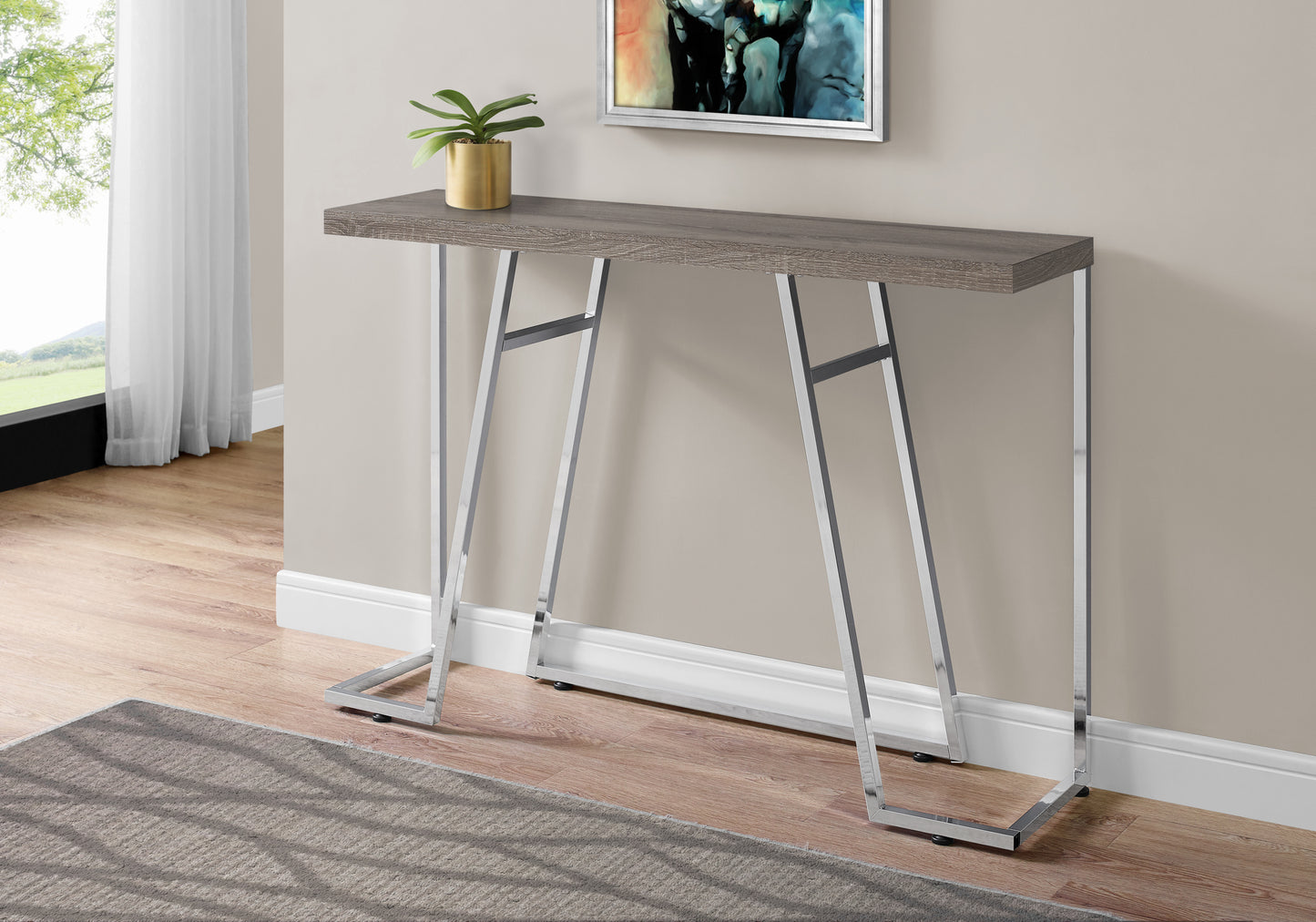 Modern grey wood grain console table with sleek chrome metal legs perfect for entryways