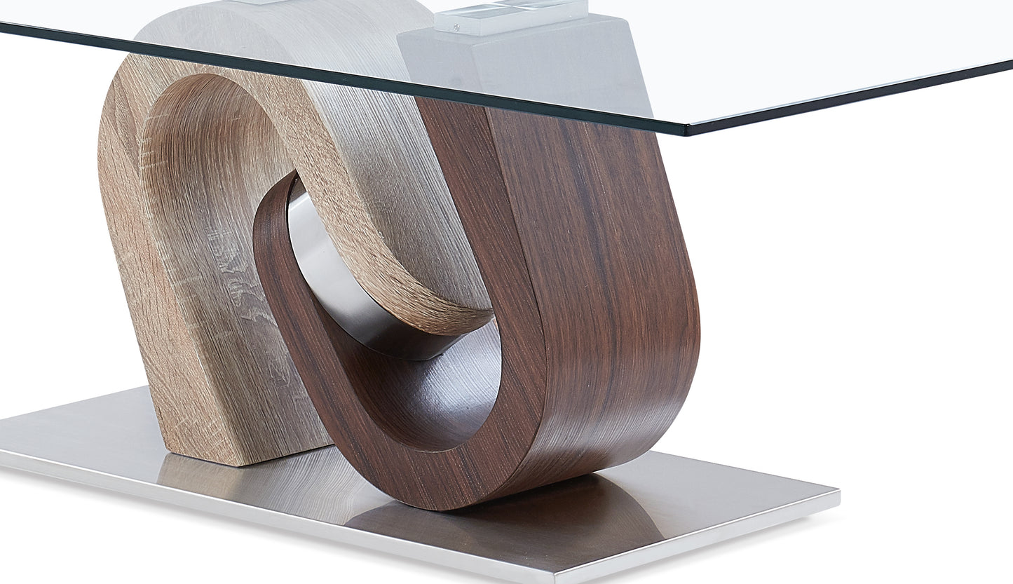 Modern coffee table with a glass top and a sculpted wood veneer base in walnut and light oak finishes