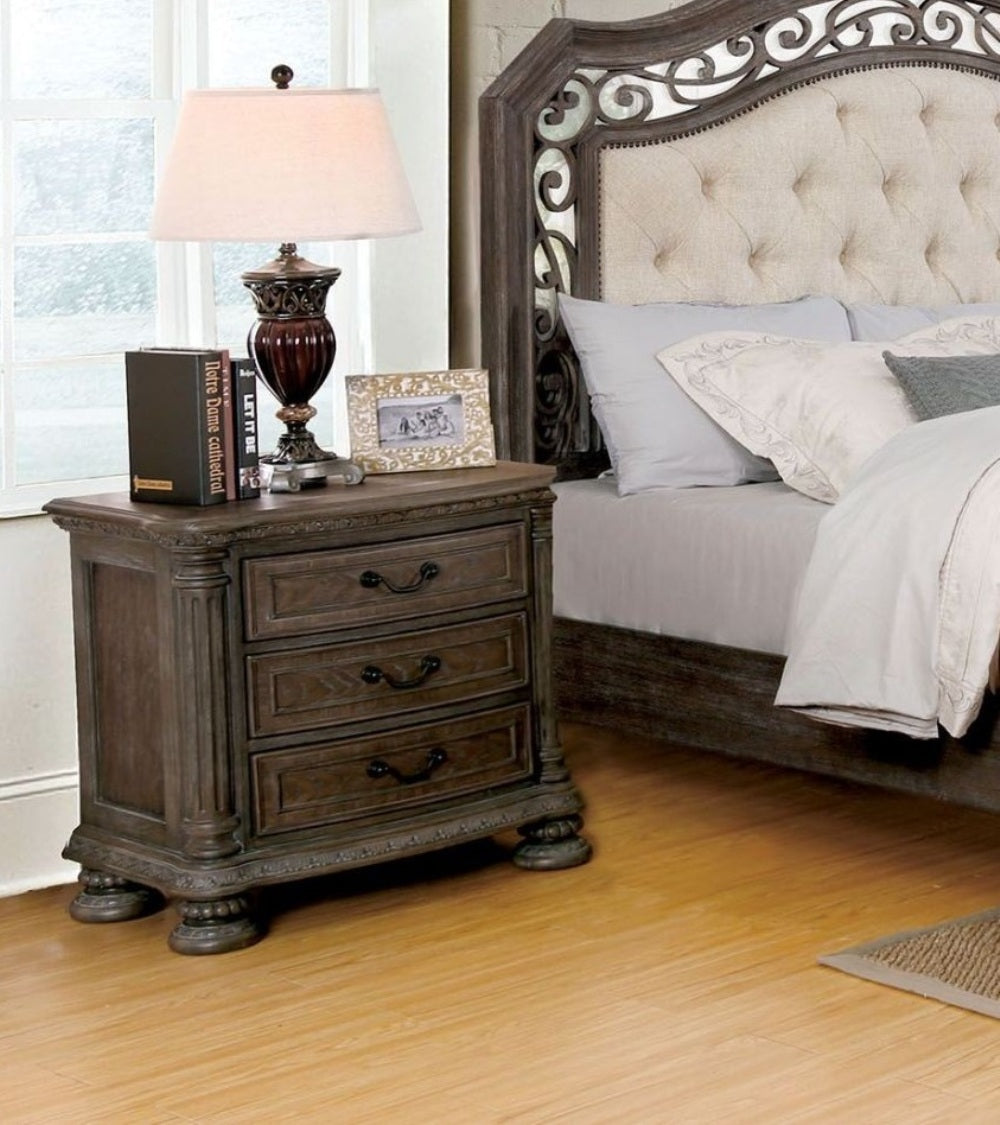 Antique brown wood nightstand with three drawers and ornate detailing