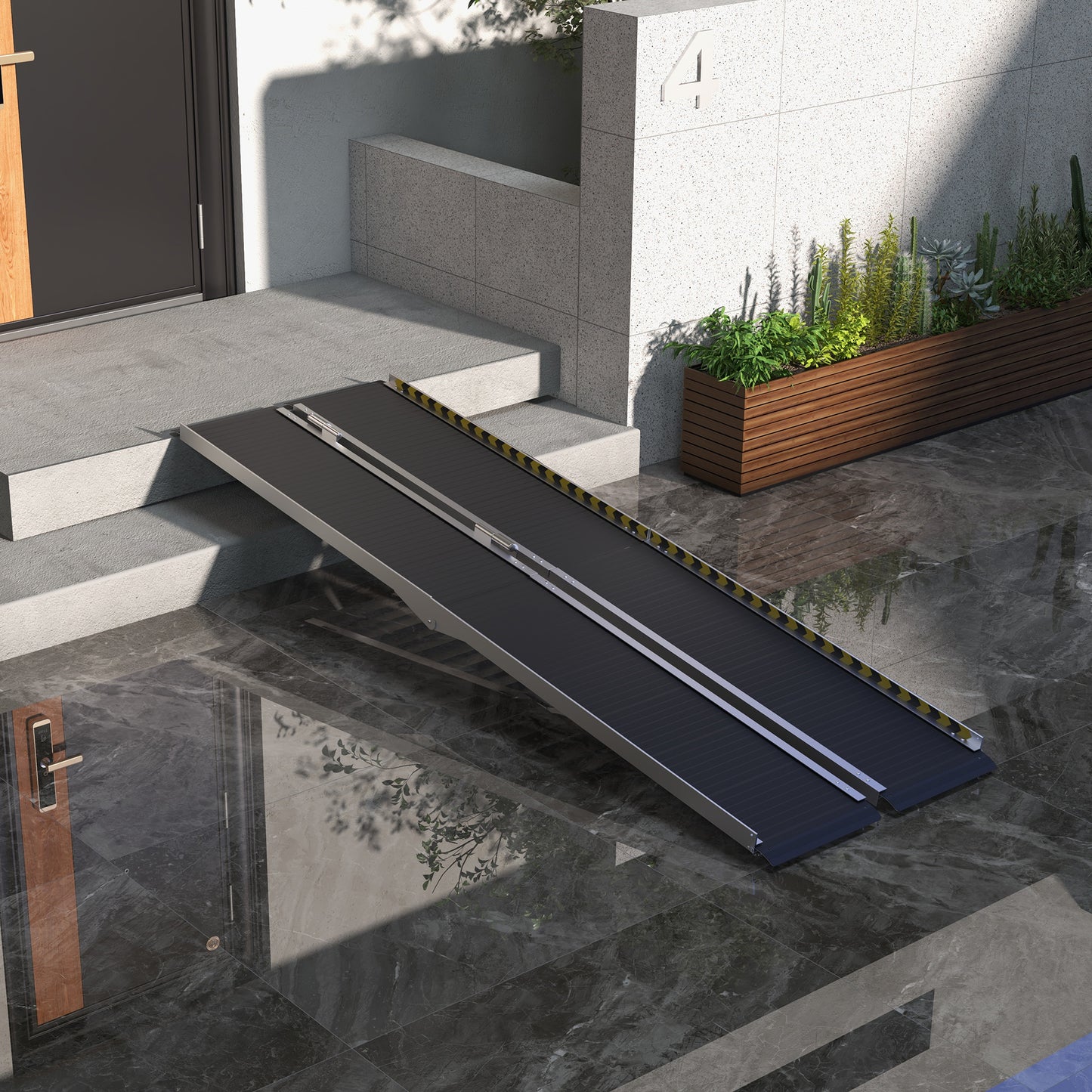 Portable wheelchair ramp with black rubber surface and silver aluminum frame