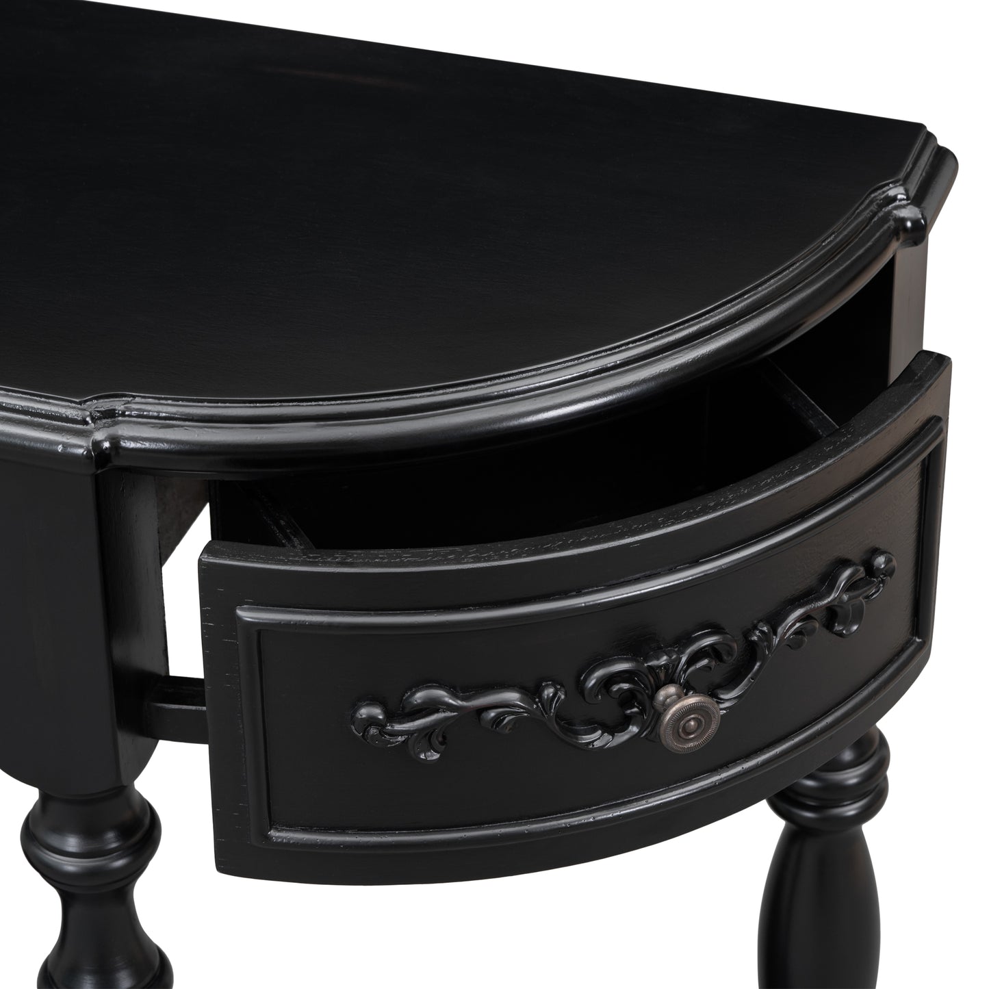 Black antique console table with carved drawer front and turned legs