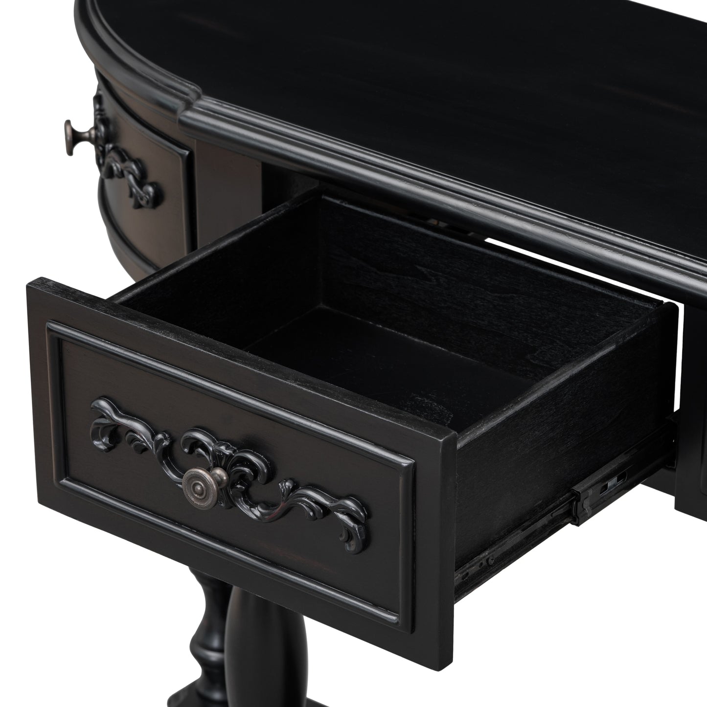 Ornate black wood console table with an open drawer and vintage pull