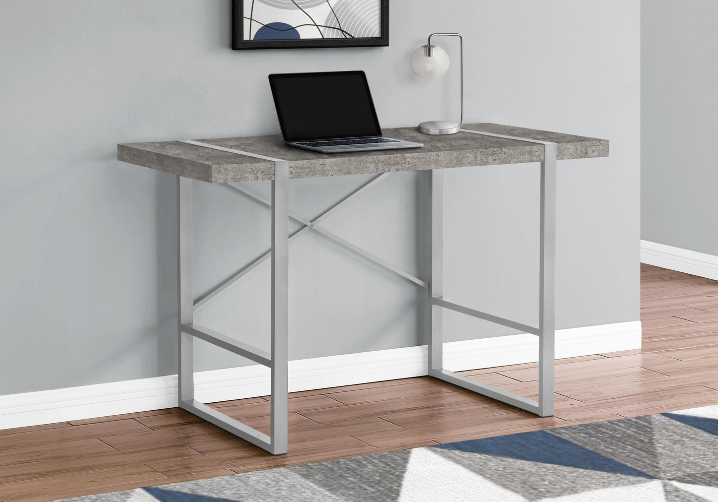 Modern concretelook desk with silver metal frame ideal for home office setups
