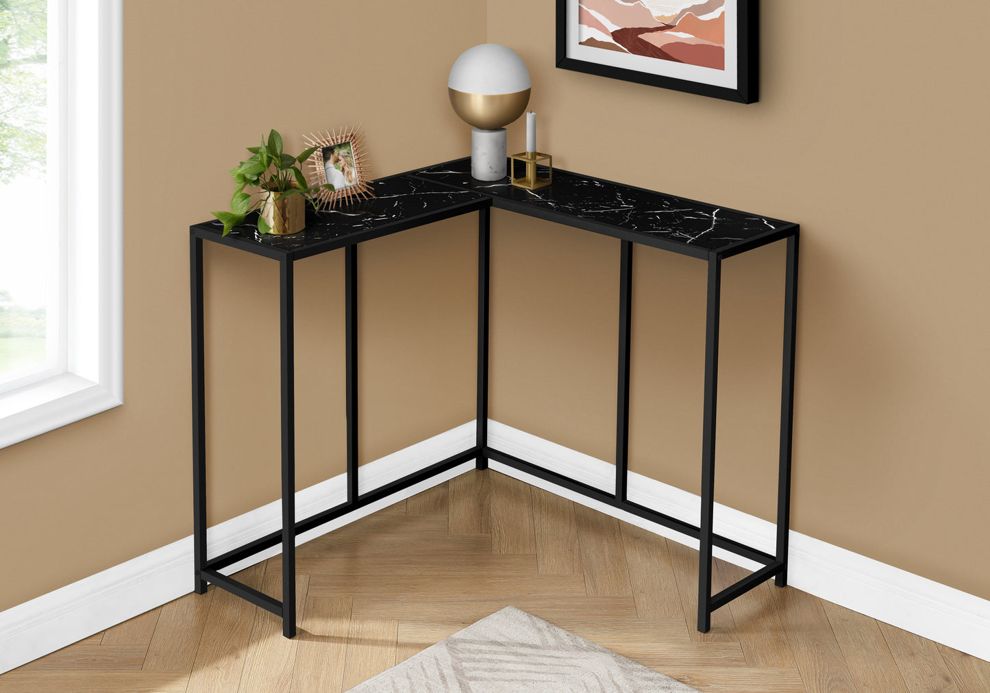 Black marble corner console table with thin metal legs