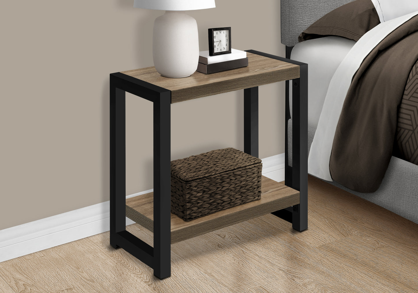 Rustic oak veneer end table with black metal frame featuring two shelves and a woven storage basket