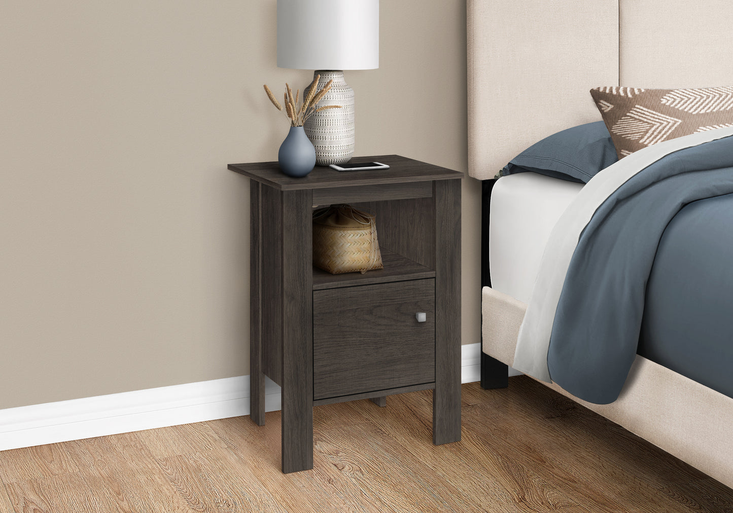 Dark gray wood nightstand with open shelf and drawer beside a bed