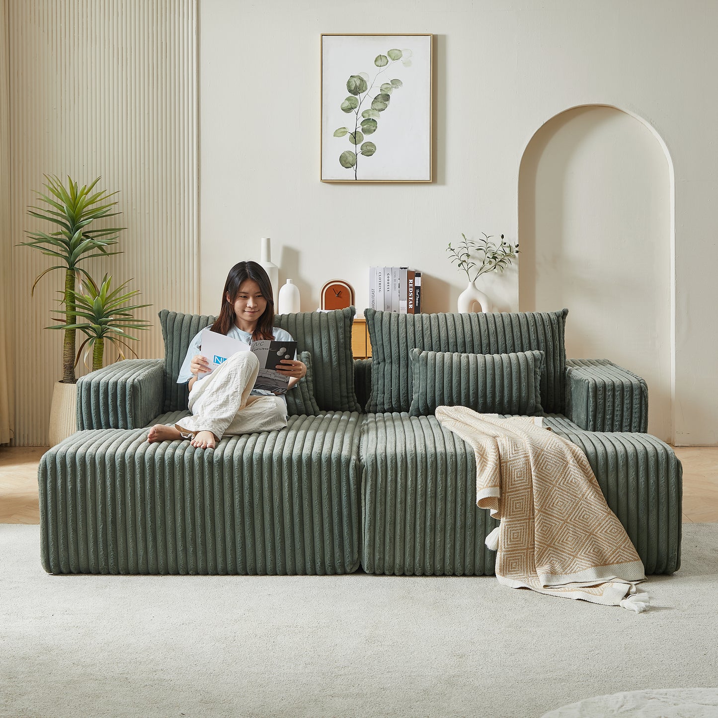 Sage green corduroy modular sofa with plush cushions perfect for a modern living room