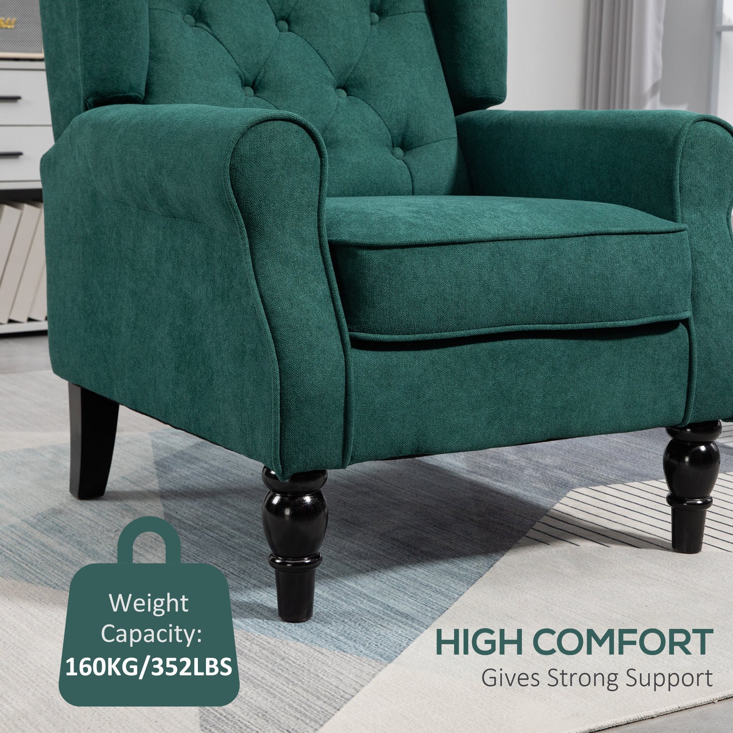 Deep emerald green upholstered wingback armchair with tufted back and rolled arms
